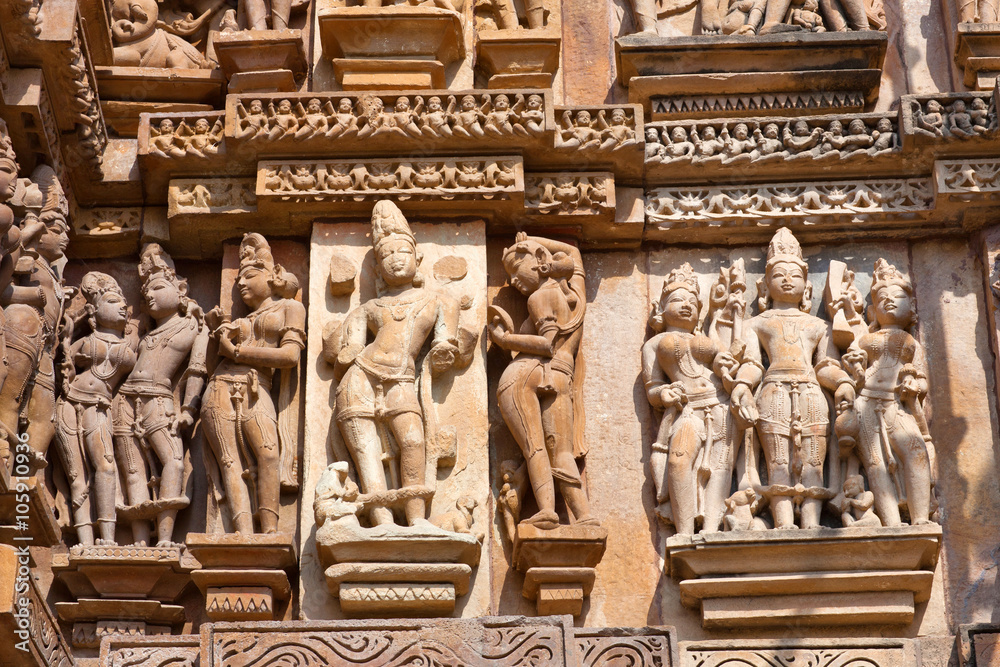 Bas-relief at famous ancient temple in Khajuraho, India Bas-relief at famous ancient temple in Khajuraho, India