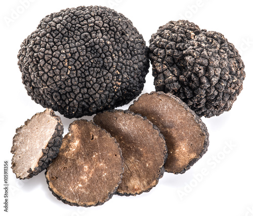 Black truffles isolated on a white background.