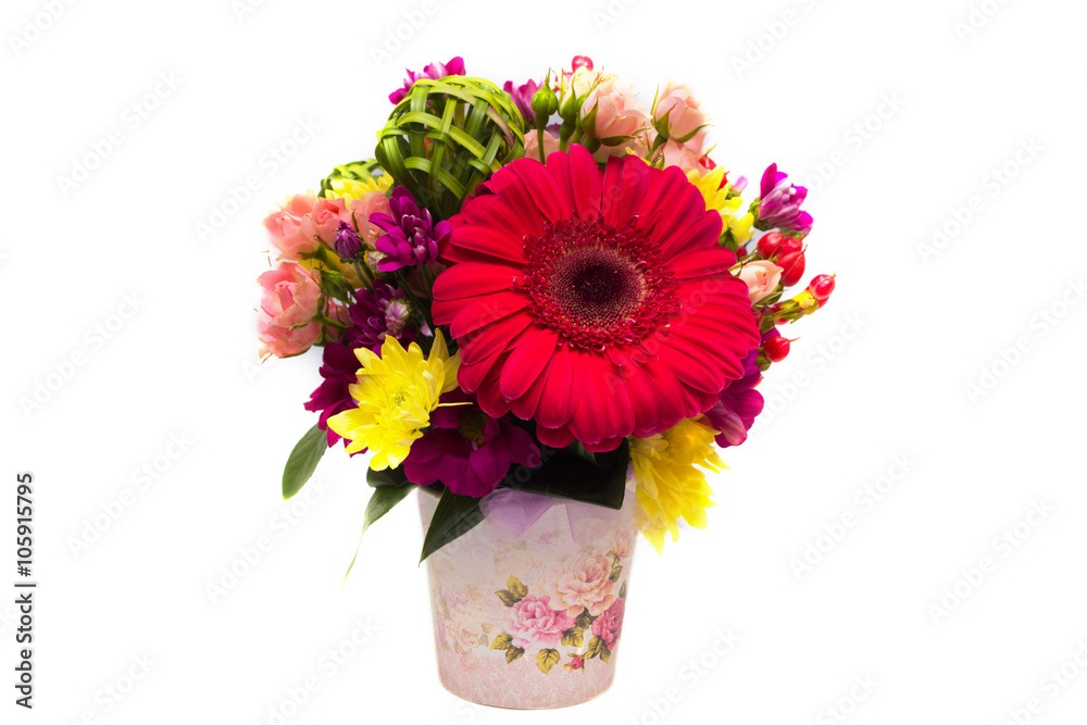 
Spring, summer floral arrangement for the wedding , favorite , friend , a gift of flowers gerbera , hypericum , chrysanthemums in a vintage pot on a white background . Isolated 