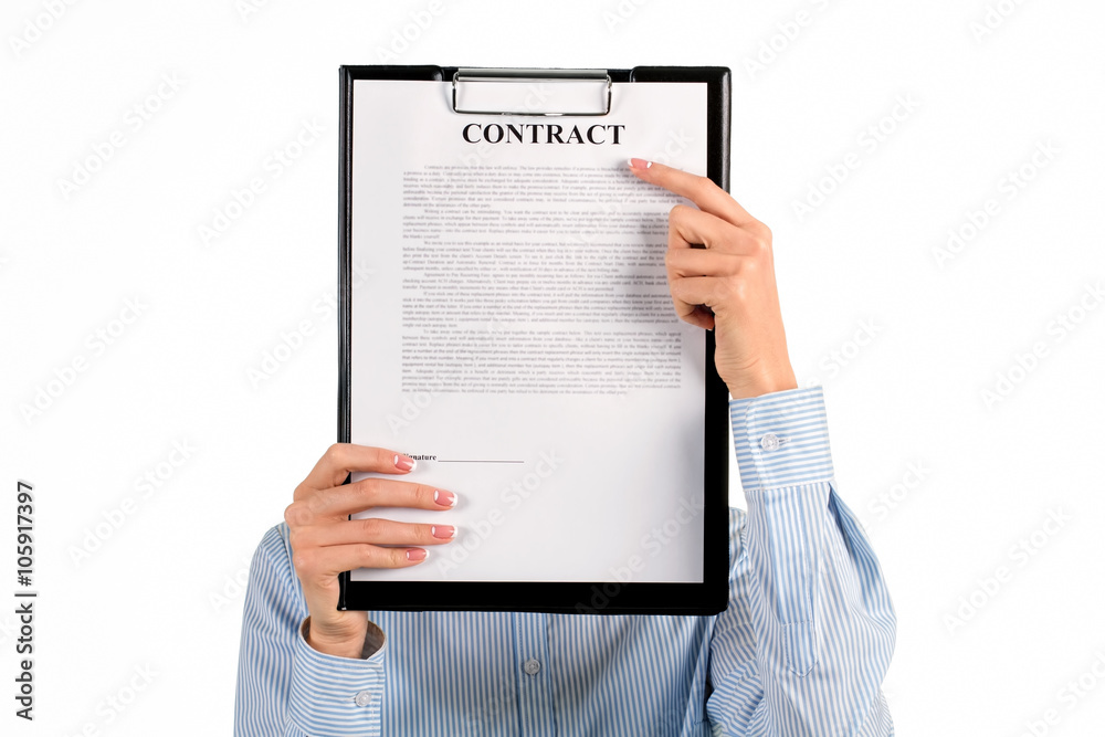 Secretary hiding face behind clipboard. Secretary hiding face behind clipboard.