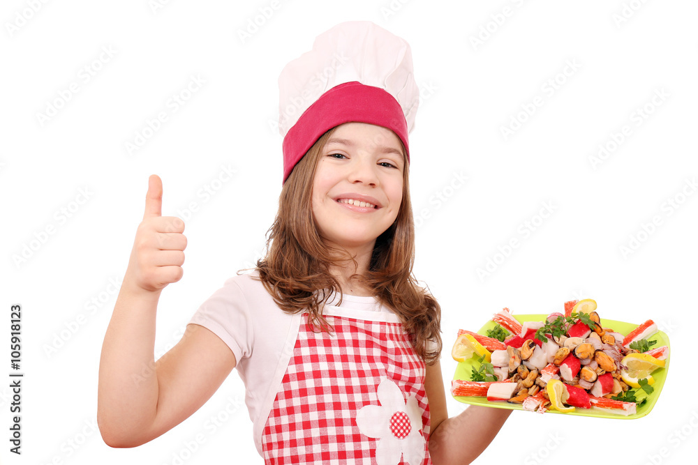 happy little girl cook with seafood and thumb up happy little girl cook with seafood and thumb up