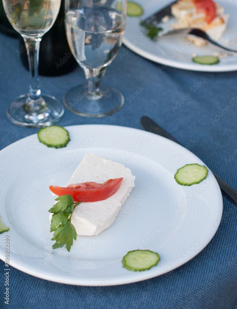 Cheese on a plate in restaurant Cheese on a plate in restaurant
