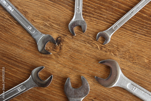 set of mechanical hand tools on wooden background