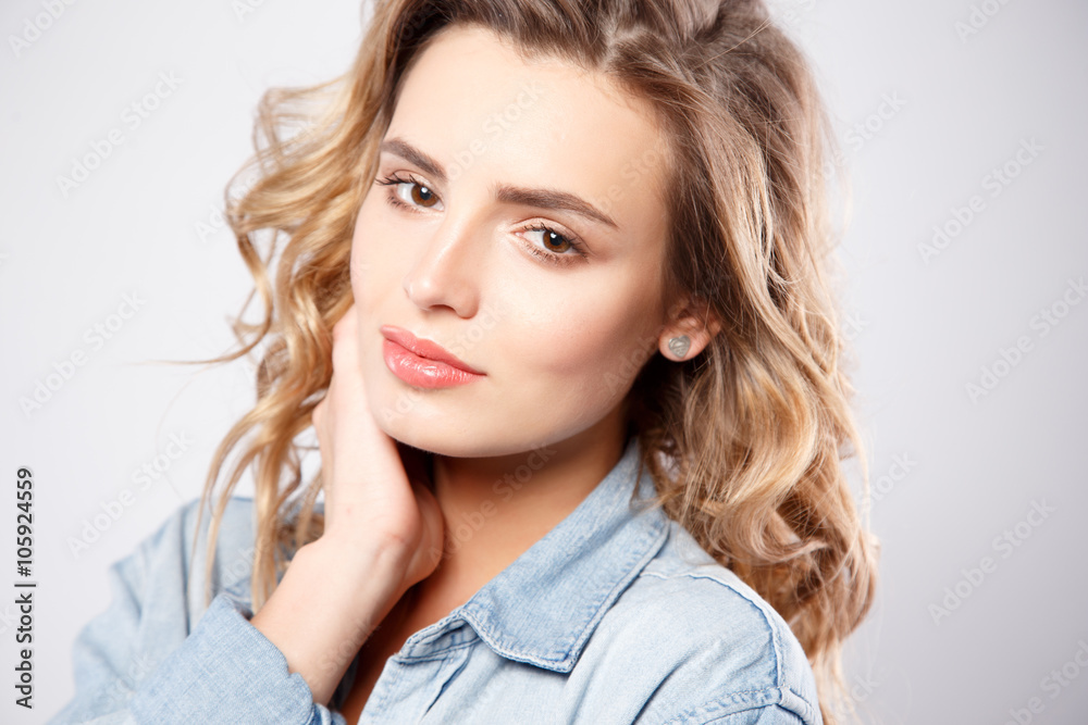 Close-up portrait of beautiful young woman with gorgeous hair and natural makeup. Fashion beauty photo Close-up portrait of beautiful young woman with gorgeous hair and natural makeup. Fashion beauty photo