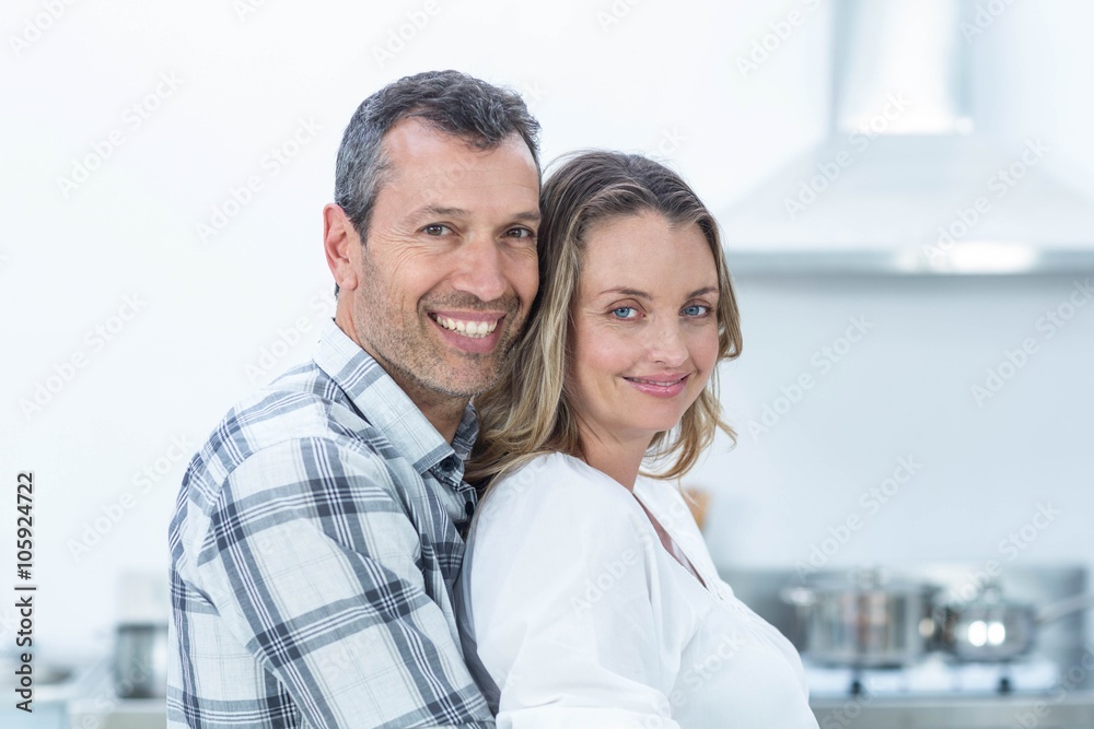 Pregnant couple in kitchen Pregnant couple in kitchen