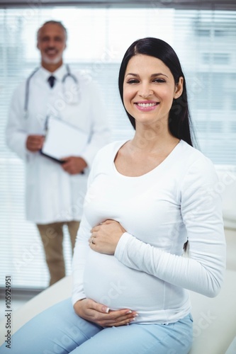 Pregnant woman interacting with doctor Free Download Pregnant woman interacting with doctor - GFXLoad