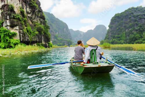 Tourists in boat, Vietnam.