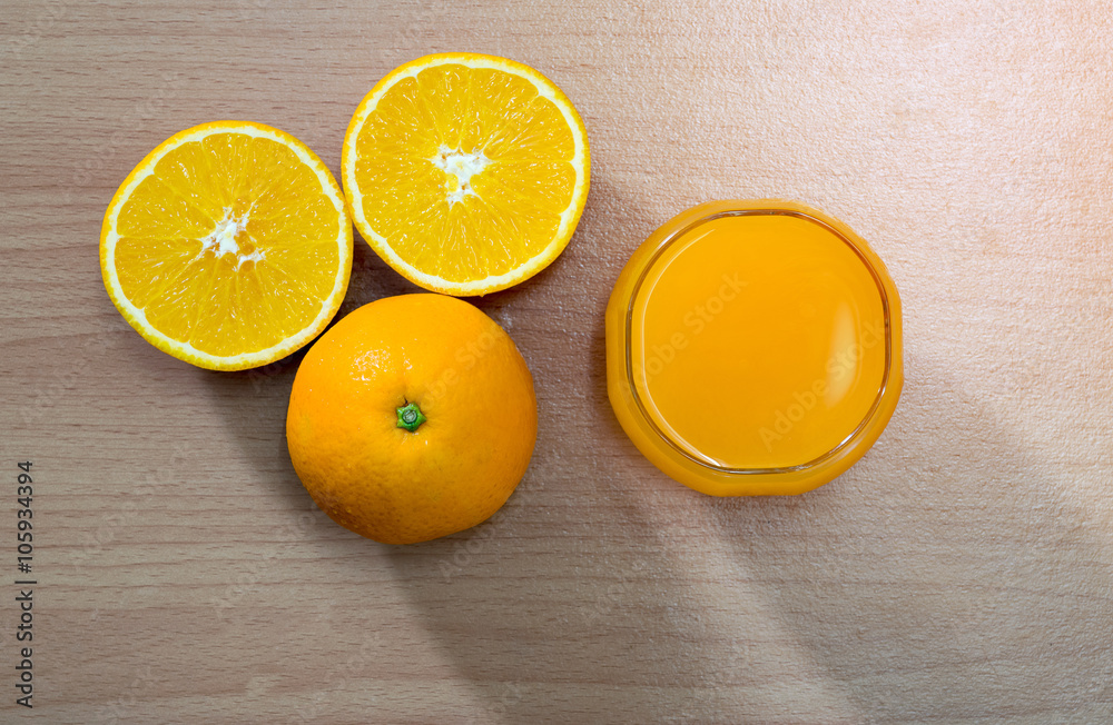 Top view of the orange juice and oranges. Top view of the orange juice and oranges.
