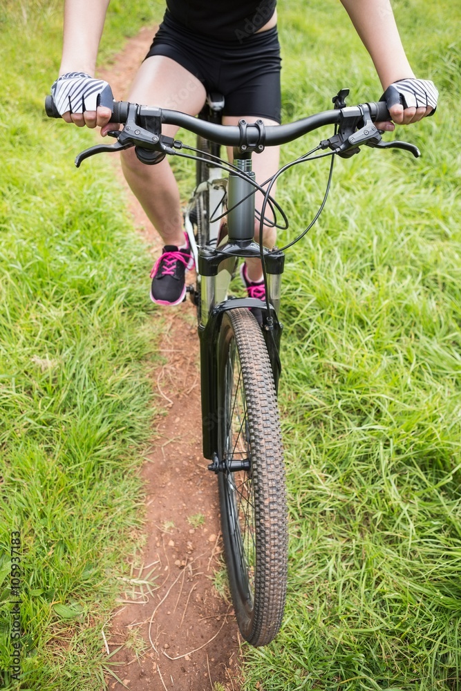 Close-up of woman cycling Close-up of woman cycling
