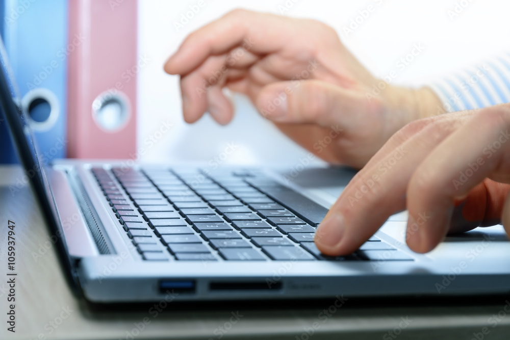 Close-up of typing hands Close-up of typing hands