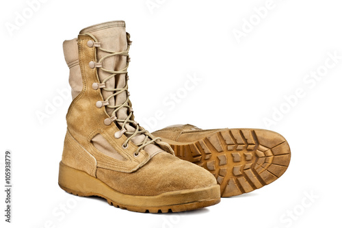 standing and lying army boots isolated on white background
