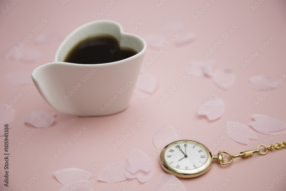 coffee , pocket watch and sakura petals