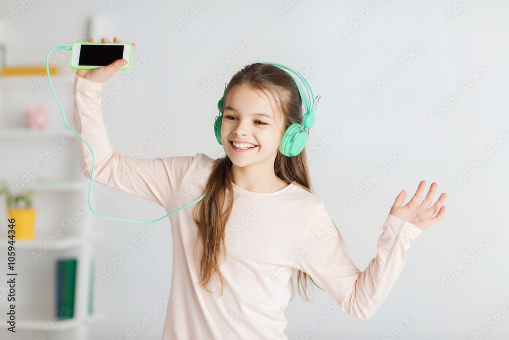 girl with smartphone and headphones at home girl with smartphone and headphones at home