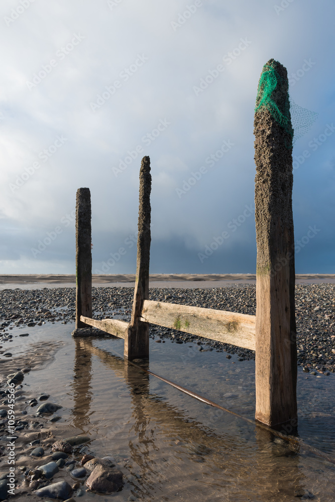 cleveleys, england, 02/17/2016, A rustic, weathered wooden sea defence wall, showing signs of damage... cleveleys, england, 02/17/2016, A rustic, weathered wooden sea defence wall, showing signs of damage...