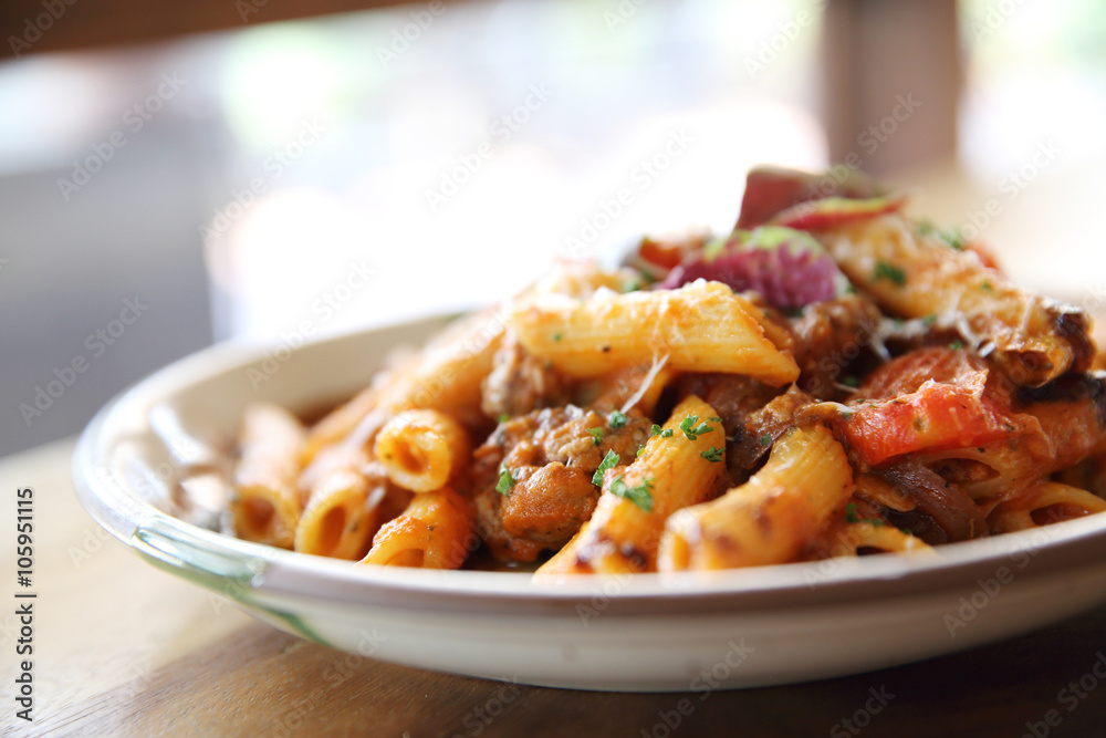 Penne pasta in tomato sauce with meatballs Penne pasta in tomato sauce with meatballs