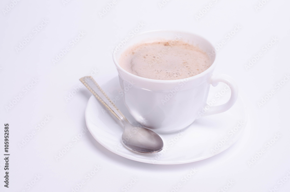 A cup of cappuccino coffee on white background A cup of cappuccino coffee on white background