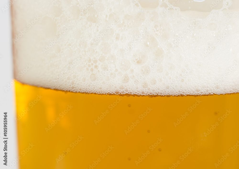 Frosty glass of light beer set isolated on a white background Frosty glass of light beer set isolated on a white background