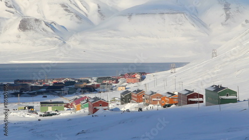 Longyearbyen, Svalbard. Norway. The small town is surrounded by mountains. A Sunny day in March. Timelapse.