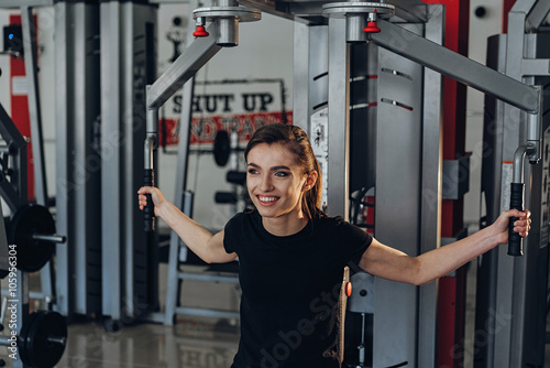 The girl at the gym on a simulator