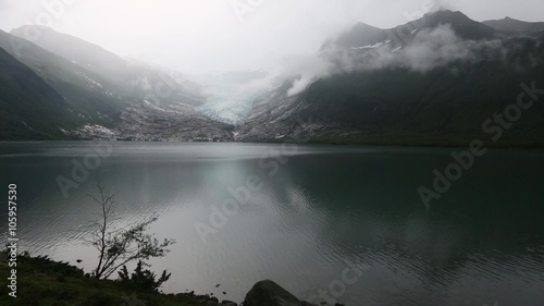 Evening Misty View on Lake and Glacier (Norway).
 photo