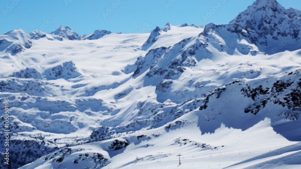 White snow-covered mountains in Italy. Rutor glacier. White snow-covered mountains in Italy. Rutor glacier.
