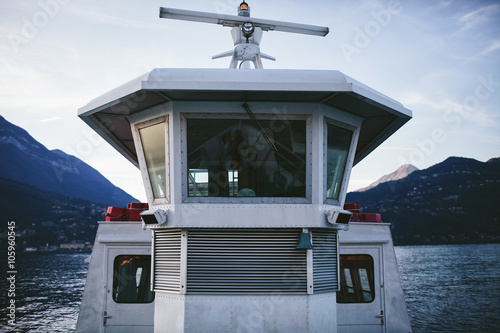 deckhouse boats on a background of mountains