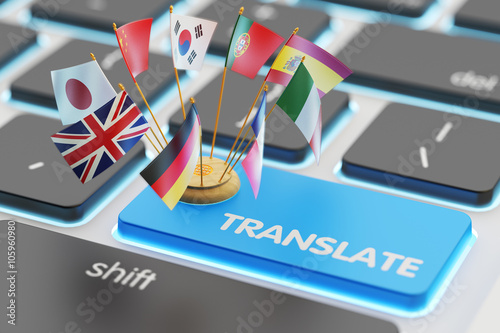 Foreign languages translation concept, online translator, macro view of computer keyboard with national flags of world countries on blue translate button photo