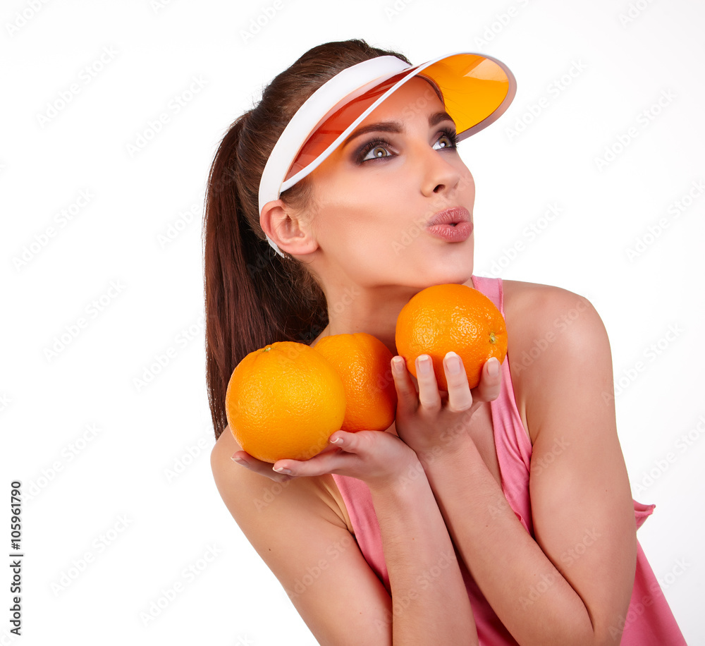 Beautiful close-up young woman with oranges. Healthy food concep Beautiful close-up young woman with oranges. Healthy food concep