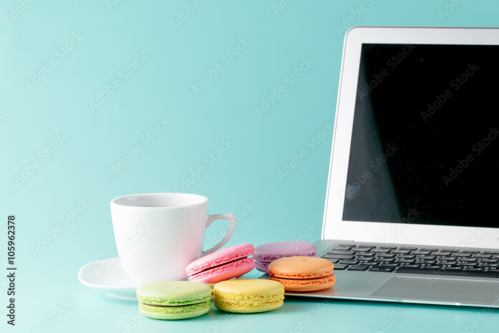 Cup of coffee and french macaron Cup of coffee and french macaron