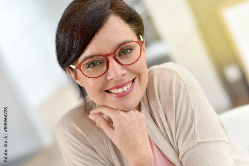 Portrait of middle-aged woman wearing eyeglasses Portrait of middle-aged woman wearing eyeglasses