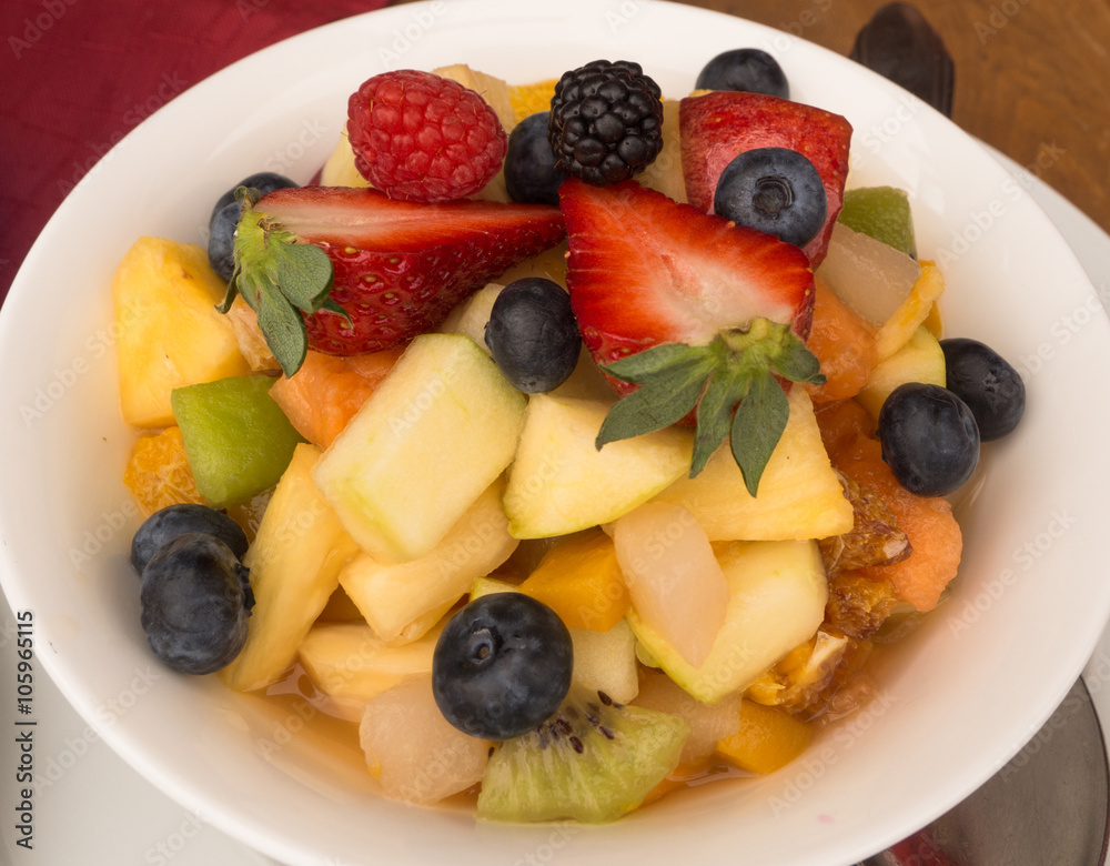 random kinds of fruit stacked on plate in Seiser Alm in South Tirol random kinds of fruit stacked on plate in Seiser Alm in South Tirol