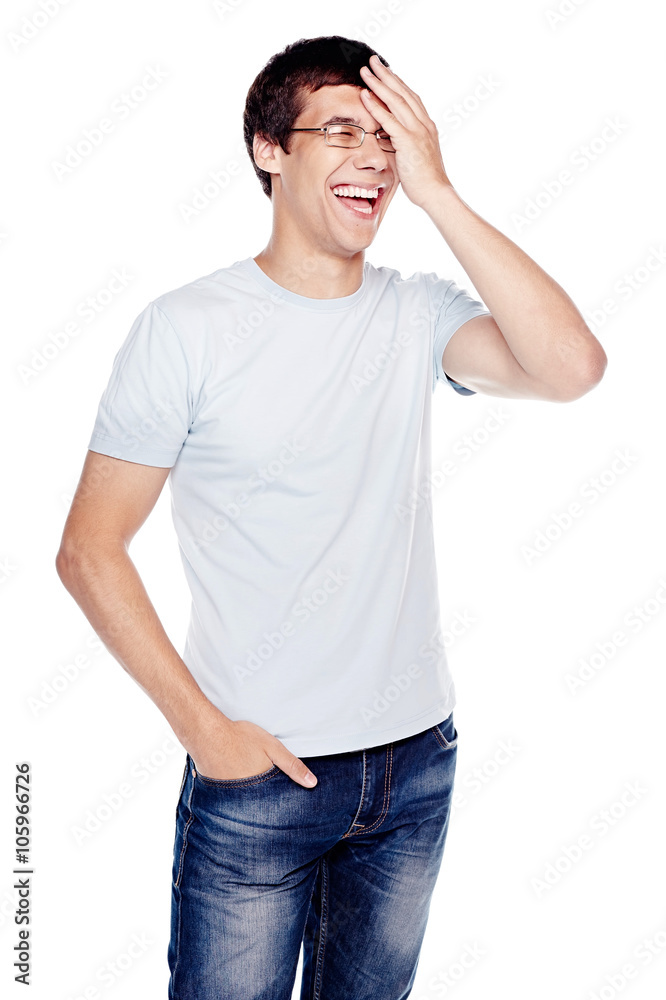 Laughing guy with hand on face