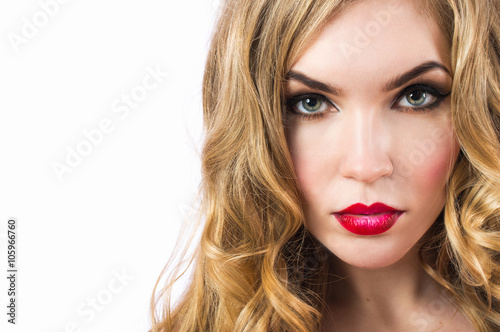 Portrait of young beautiful sexy girl with bright makeup. Face of the beautiful girl close up on a white background.