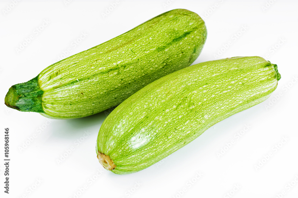 Fresh Green Zucchini on White Background Fresh Green Zucchini on White Background