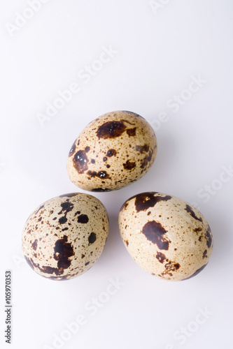 quail eggs on a white background. Food image with space for text