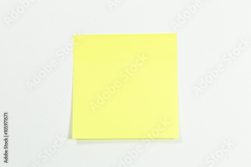 yellow stick note isolated on white background