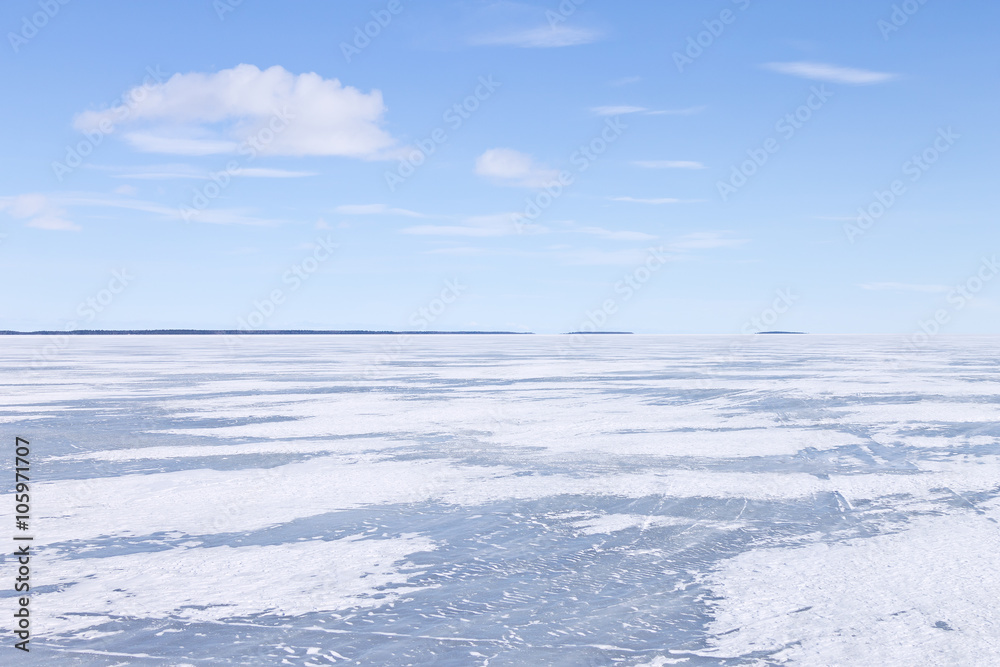 Frozen lake on a clear winter day Frozen lake on a clear winter day
