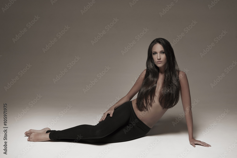 Sexy brunette woman wearing black leggings Sexy brunette woman wearing black leggings