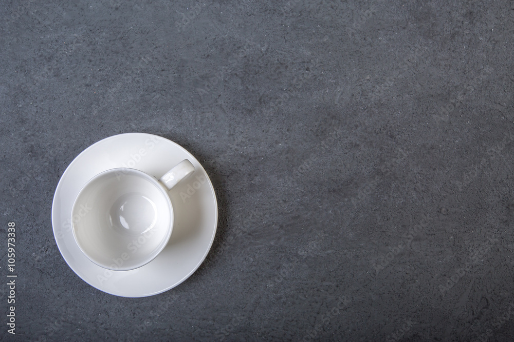 Cup of coffee on a black wooden table background. Cup of coffee on a black wooden table background.