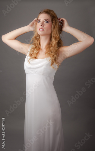 Pretty Young Woman in Long White Dress