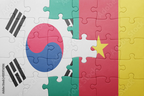 puzzle with the national flag of south korea and cameroon