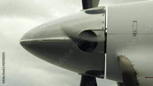 Airplane Propeller Starting to Spin, Slow Zoom Out