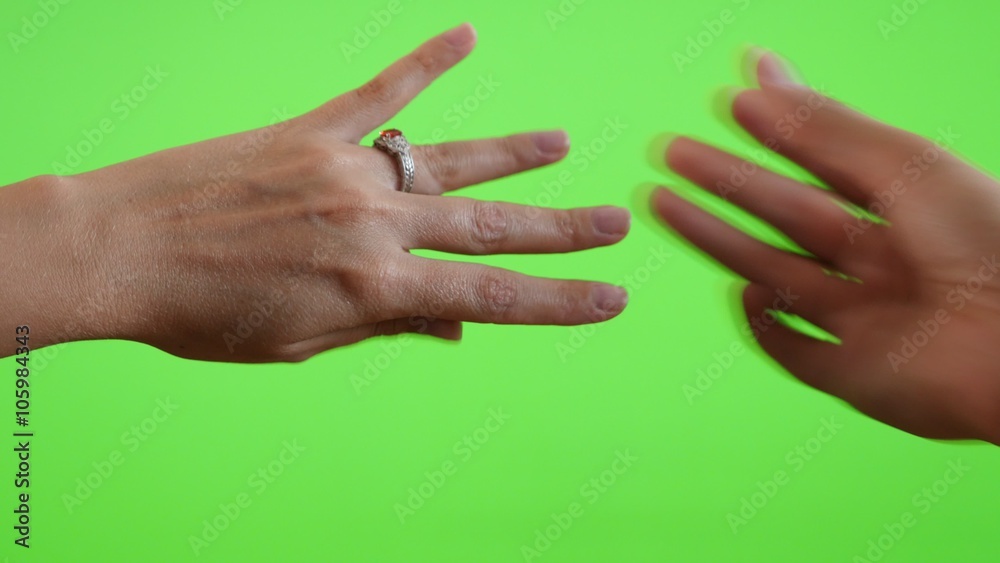 Male hand gives new ring in front of green screen chroma key background 4K 3840X2160 UltraHD footage - Greenscreen woman and man hands ring displaying 4K 2160p UHD video 