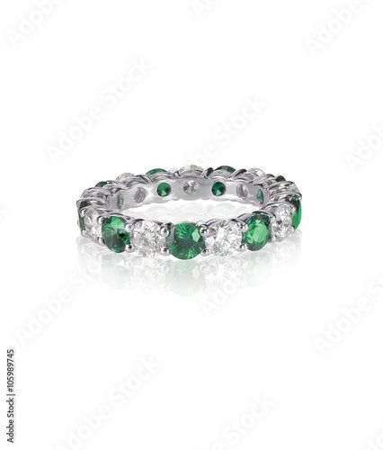 green emerald and diamond wedding band ring isolated on white