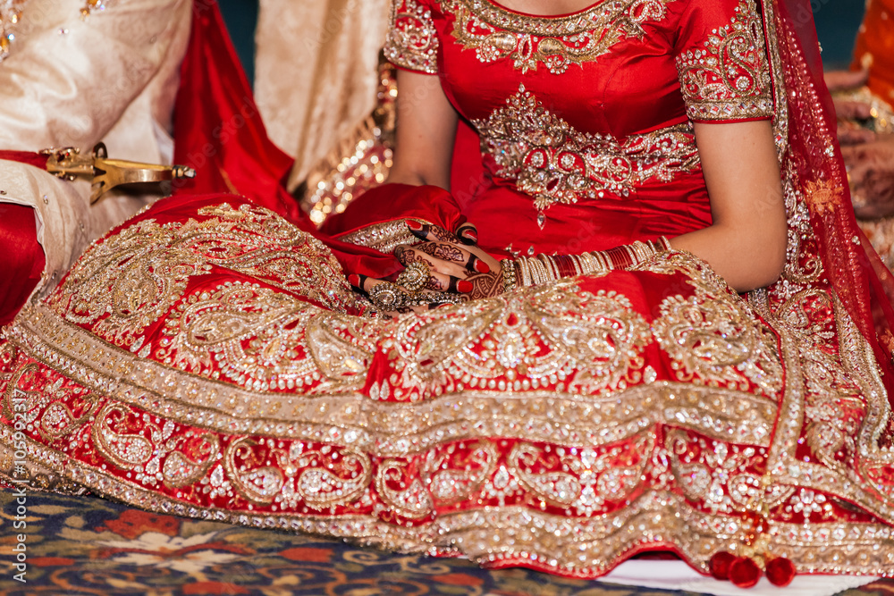 Indian bride and groom in a temple during wedding ceremony. 