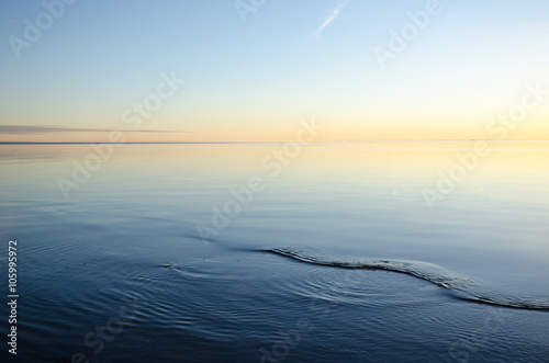 Smooth water and colorful sky