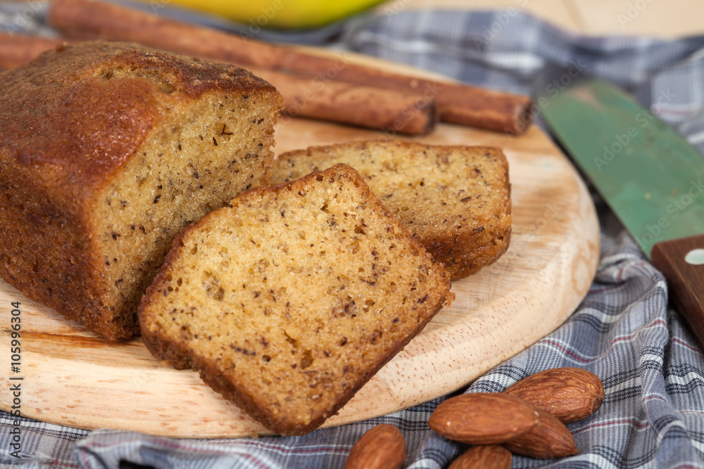 Homemade banana bread sliced on a table . rustic style Homemade banana bread sliced on a table . rustic style