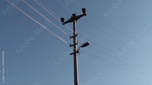 Electricity pylon against tsky photo