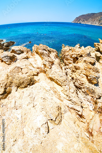 in europe greece the mykonos island rock sea and beach blue sk