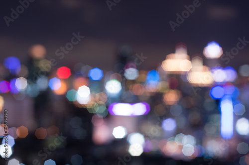 Abstract blurred bokeh lights city skyline during twilight